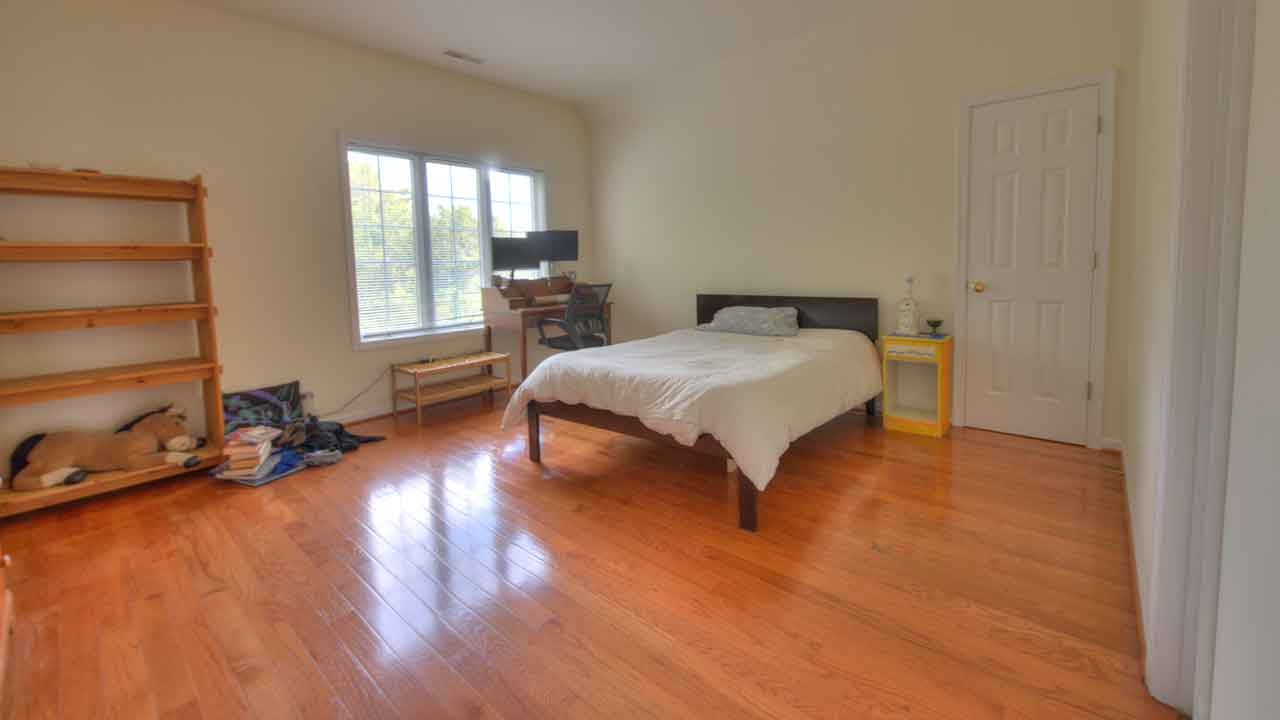 Cozy upper bedroom at Cheval Noir with natural light and serene ambiance