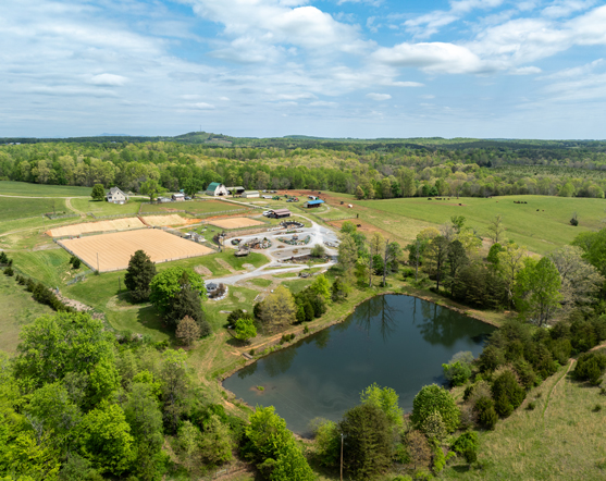 Headens Bridge - Scenic view of riding ring, pond and surrounding landscape